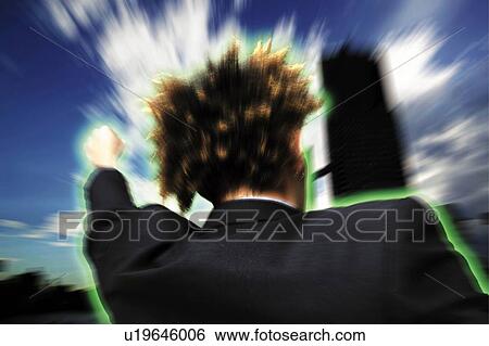 Stock Photograph - Young Businessman Kicking. Fotosearch