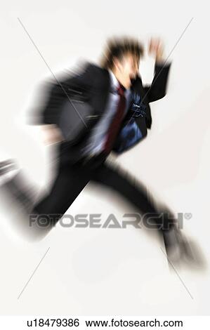 Stock Photograph - Young Businessman Running. Fotosearch