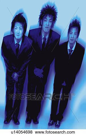 Stock Photo - Young Businessmen Bowing. Fotosearch