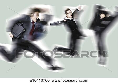 Stock Image - Young Businessmen, Running, Jumping, Kicking. Fotosearch