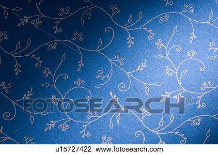 Stock Image - Close-up of floral pattern on handmade paper. Fotosearch