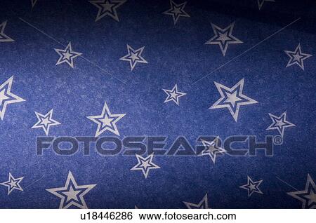 Stock Photograph - Close-up of stars on handmade paper. Fotosearch