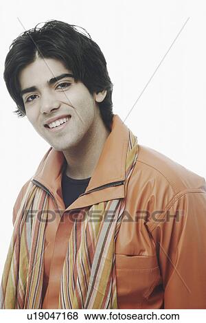 Stock Photo - Portrait of a young man smiling. Fotosearch