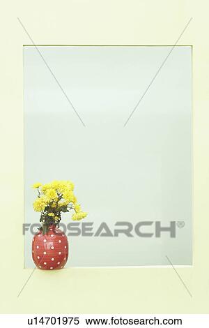 Stock Photography - Close-up of a flower pot on a window ledge. Fotosearch