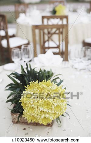 Stock Image - High angle view of a bouquet of flowers on the dining table. Fotosearch