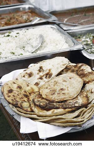 Close-up of Indian cuisine on a table View Large Photo Image Picture - Close-up of Indian cuisine on a table. Fotosearch