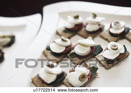 High angle view of appetizers on a tray View Large Photo Image Picture - High angle view of appetizers on a tray. Fotosearch