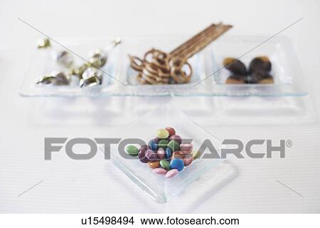 Picture - High angle view of candy in a bowl. Fotosearch