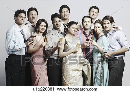 Portrait of a group of people holding drinks View Large Photo Image Stock Image - Portrait of a group of people holding drinks. Fotosearch