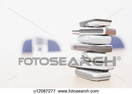 Close-up of a stack of mobile phones View Large Photo Image Stock Photo - Close-up of a stack of mobile phones. Fotosearch