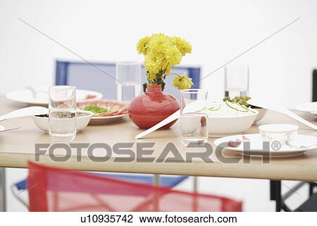 Close-up of food with two glasses of water on the dining table View Large Photo Image Stock Image - Close-up of food with two glasses of water on the dining table. Fotosearch