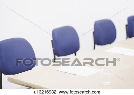 Stock Image - Empty chairs in a room. Fotosearch