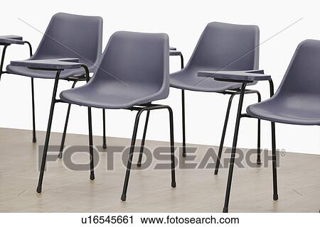Stock Image - Empty chairs in a room. Fotosearch