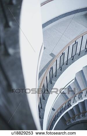 Stock Image - High angle view of a spiral staircase. Fotosearch