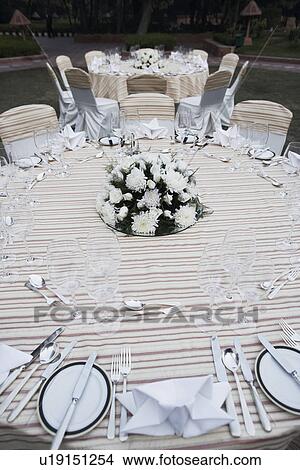 Picture - High angle view of an empty dining table. Fotosearch