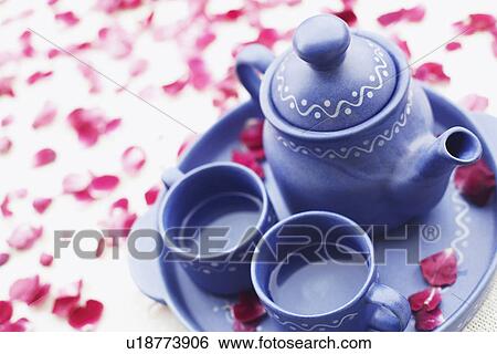 High angle view of tea set on the table View Large Photo Image Stock Photograph - High angle view of tea set on the table. Fotosearch