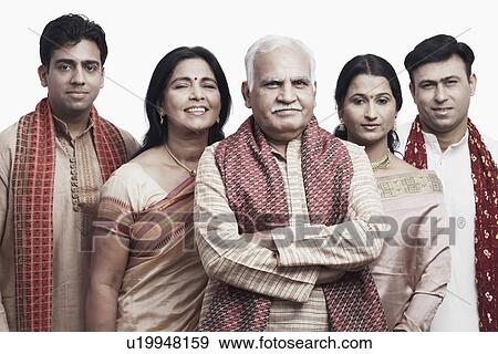 Stock Photo - Portrait of a mature couple and their children smiling. Fotosearch