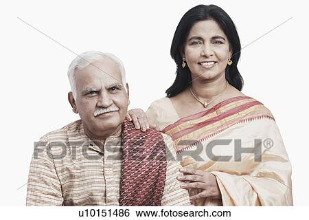 Portrait of a mature couple smiling View Large Photo Image Stock Photograph - Portrait of a mature couple smiling. Fotosearch
