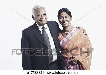 Portrait of a mature couple smiling View Large Photo Image Stock Photograph - Portrait of a mature couple smiling. Fotosearch