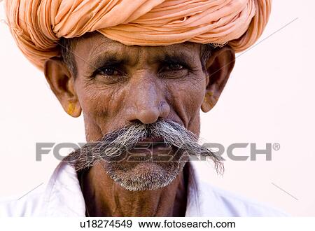 Stock Photo - Portrait of a mature man wearing a turban, Pushkar, Rajasthan, India. Fotosearch