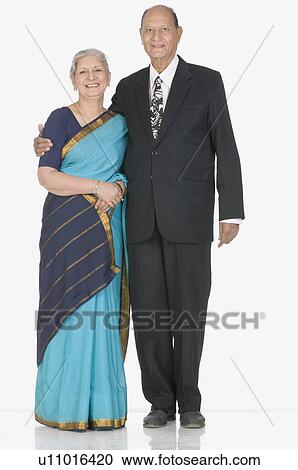 Stock Image - Portrait of a senior man and a mature woman smiling. Fotosearch