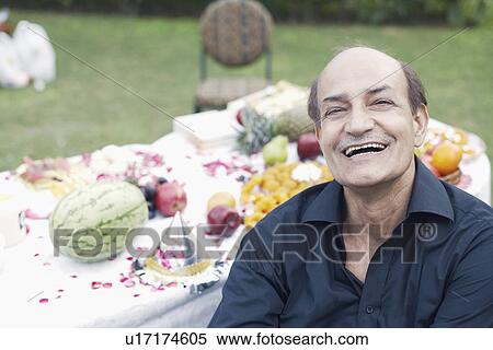 Portrait of a senior man smiling View Large Photo Image Stock Photography - Portrait of a senior man smiling. Fotosearch