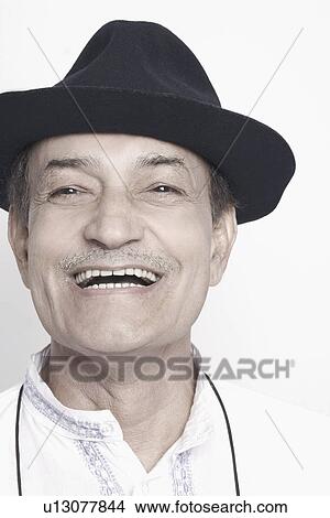 Picture - Portrait of a senior man wearing a hat. Fotosearch