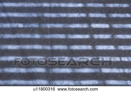 Close-up of a shadow on handmade paper View Large Photo Image Stock Photograph - Close-up of a shadow on handmade paper. Fotosearch