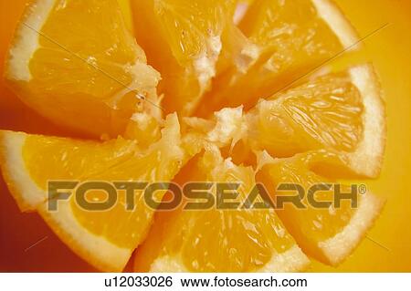 Stock Photograph - Fruit, Fruits, Orange, Orange fruit, Half, Cut, Half an orange. Fotosearch