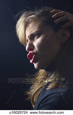 People, Attitudes, Young Attitudes, Woman, Face, Blond, Blond hair View Large Photo Image Picture - People, Attitudes, Young Attitudes, Woman, Face, Blond, Blond hair. Fotosearch