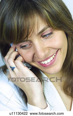 Stock Image - People, Attitudes, Young Attitudes, Woman, Face, Blond, Blond hair. Fotosearch