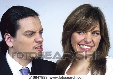 Stock Image - People, Attitudes, Young Attitudes, Face, Hand, Portrait. Fotosearch