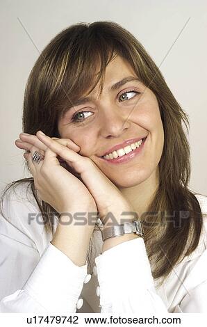 Stock Image - People, Attitudes, Young Attitudes, Woman, Face, Blond, Blond hair. Fotosearch