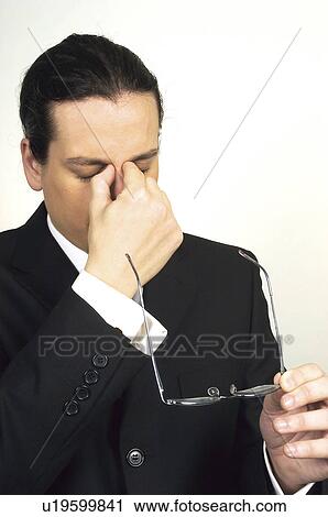 Stock Image - People, Attitudes, Young Attitudes, Face, Hand, Goatee. Fotosearch