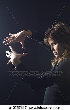 Stock Photo - People, Attitudes, Young Attitudes, Woman, Face, Blond, Blond hair. Fotosearch