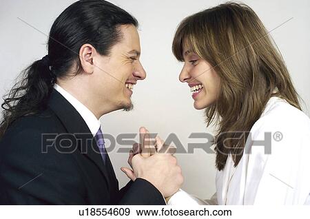 Stock Photo - People, Attitudes, Young Attitudes, Face, Hand, Portrait. Fotosearch
