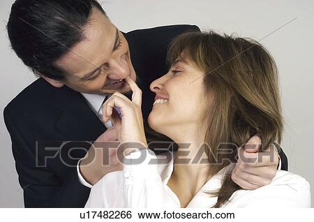 Stock Photograph - People, Attitudes, Young Attitudes, Face, Hand, Portrait. Fotosearch