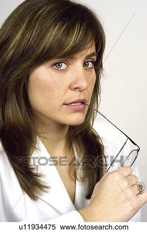 Stock Photography - People, Attitudes, Young Attitudes, Woman, Face, Blond, Blond hair. Fotosearch
