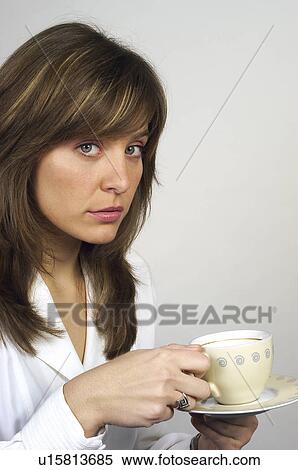 Stock Photography - People, Attitudes, Young Attitudes, Woman, Face, Blond, Blond hair. Fotosearch