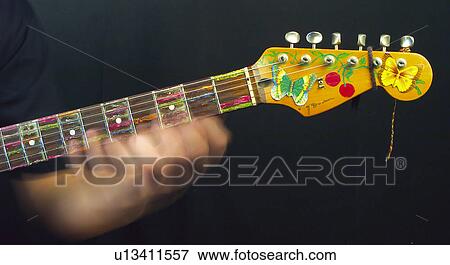 Stock Photo - Guitar, Electrical guitar, Handle, String, Strings, Decorated, Painted. Fotosearch