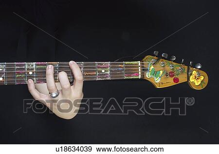 Guitar, Electrical guitar, Handle, String, Strings, Decorated, Painted View Large Photo Image Stock Photo - Guitar, Electrical guitar, Handle, String, Strings, Decorated, Painted. Fotosearch