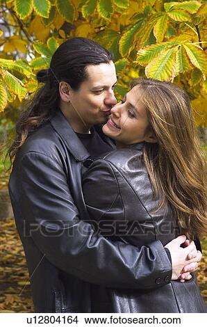 Picture - People, Attitudes, Young Attitudes, Woman, Young woman, Young man. Fotosearch