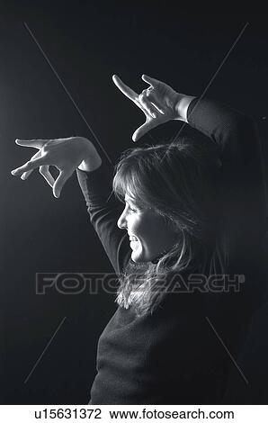 Stock Image - People, Attitudes, Young Attitudes, Woman, Young woman, Pose, Posing. Fotosearch