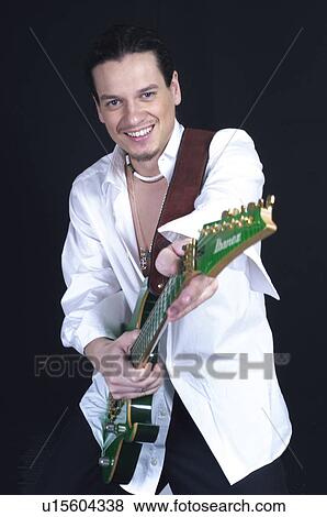 Stock Photo - People, Attitudes, Young Attitudes, Young man, Brown, Brown hair. Fotosearch