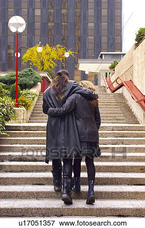 Stock Photo - People, Attitudes, Young Attitudes, Woman, Young woman, Young man. Fotosearch