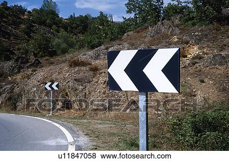 Stock Photo - Road, Road sign, Road signs, Traffic sign, Traffic signs, Arrow, Arrows. Fotosearch