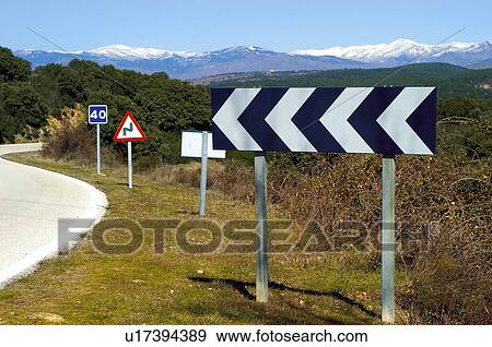 Stock Photo - Road, Road sign, Road signs, Traffic sign, Traffic signs, Exterior, Mountain. Fotosearch