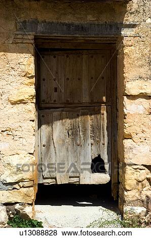 Stock Photo - Spain, Spanish, Building, Door, Plank, Planks, Facade. Fotosearch