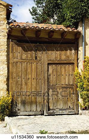 Stock Image - Spain, Spanish, Building, Door, Wood, Wooden door, Garage. Fotosearch