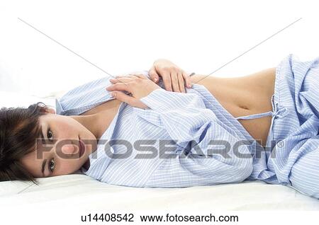 Woman, Beauty, Bed, Young, Young woman, Brown hair, Morning View Large Photo Image Stock Image - Woman, Beauty, Bed, Young, Young woman, Brown hair, Morning. Fotosearch